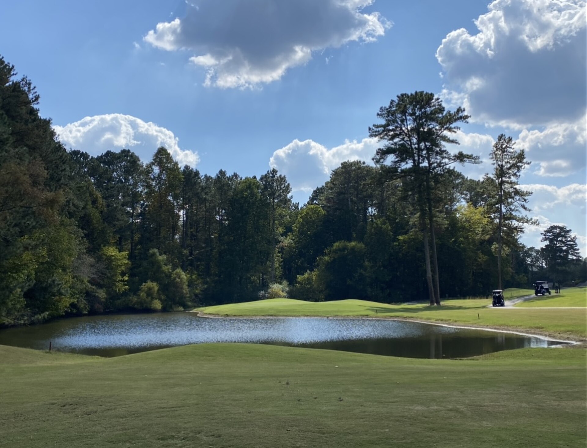 Nob North Golf Course: a pond-fronted green framed by Whitfield County hardwoods.